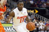 KANSAS CITY, MO - NOVEMBER 24: Erving Walker #11 of the Florida Gators drives the ball downcourt against the Syracuse Orange during the CBE Classic game on November 24, 2008 at the Sprint Center in Kansas City, Missouri. (Photo by Jamie Squire/Getty Images)