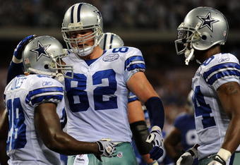 ARLINGTON, TX - SEPTEMBER 20:  Running back Felix Jones #28, Jason Witten #82 and Patrick Crayton #84 of the Dallas Cowboys at Cowboys Stadium on September 20, 2009 in Arlington, Texas.  (Photo by Ronald Martinez/Getty Images)