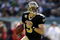 PHILADELPHIA - SEPTEMBER 20:  Drew Brees #9 of the New Orleans Saints looks for an open man during a game against the Philadelphia Eagles at Lincoln Financial Field on September 20, 2009 in Philadelphia, Pennsylvania.  (Photo by Jeff Zelevansky/Getty Images)