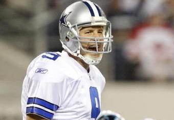ARLINGTON, TX - SEPTEMBER 28:  Tony Romo #9 of the Dallas Cowboys calls a play gainst the Carolina Panthers at Cowboys Stadium on September 28, 2009 in Arlington, Texas. (Photo by Ronald Martinez/Getty Images)