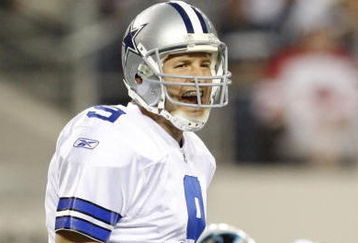 ARLINGTON, TX - SEPTEMBER 28:  Tony Romo #9 of the Dallas Cowboys calls a play gainst the Carolina Panthers at Cowboys Stadium on September 28, 2009 in Arlington, Texas. (Photo by Ronald Martinez/Getty Images)