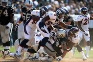 OAKLAND, CA - SEPTEMBER 27: Justin Fargas #25 of the Oakland Raiders is tackled by Andra Davis #54 of the Denver Broncos on September 27, 2009 during an NFL game at the Oakland-Alameda County Coliseum in Oakland, California. (Photo by Jed Jacobsohn/Getty Images)