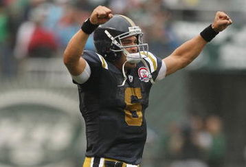 EAST RUTHERFORD, NJ - SEPTEMBER 27:  Mark Sanchez #6 of The New York Jets celebrates a touchdown in the first quarter against The Tennessee Titans during their game on September 27, 2009 at Giants Stadium in East Rutherford, New Jersey.  (Photo by Al Bello/Getty Images)