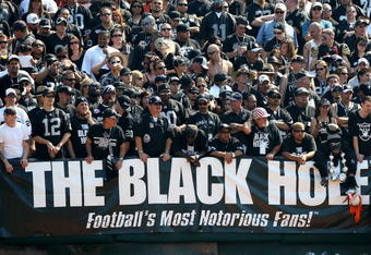 OAKLAND, CA - SEPTEMBER 27: Fans of the Oakland Raiders look on against the Denver Broncos on September 27, 2009 during an NFL game at the Oakland-Alameda County Coliseum in Oakland, California.  (Photo by Jed Jacobsohn/Getty Images)