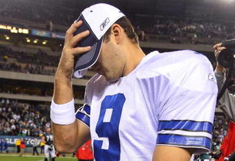 PHILADELPHIA - DECEMBER 28:  Tony Romo #9 of the Dallas Cowboys walks off the field after playing the Philadelphia Eagles on December 28, 2008 at Lincoln Financial Field in Philadelphia, Pennsylvania. The Eagles defeated the Cowboys 44-6.  (Photo by Jim McIsaac/Getty Images)