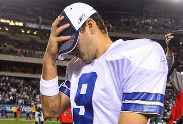 PHILADELPHIA - DECEMBER 28:  Tony Romo #9 of the Dallas Cowboys walks off the field after playing the Philadelphia Eagles on December 28, 2008 at Lincoln Financial Field in Philadelphia, Pennsylvania. The Eagles defeated the Cowboys 44-6.  (Photo by Jim McIsaac/Getty Images)