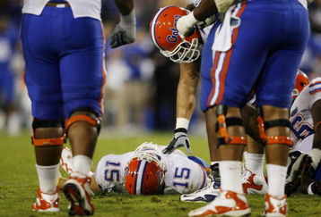 LEXINGTON, KY - SEPTEMBER 26: Quarterback Tim Tebow #15 of the Florida Gators lays on the ground after being sacked by Taylor Wyndham #94 of the Kentucky Wildcats during the third quarter of the game at Commonwealth Stadium on September 26, 2009 in Lexington, Kentucky. (Photo by Andy Lyons/Getty Images)