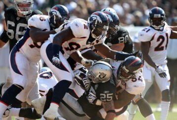 Broncos_tackle_a_raider_feature