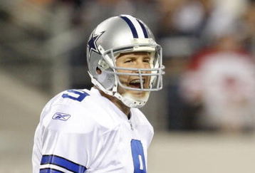 ARLINGTON, TX - SEPTEMBER 28:  Tony Romo #9 of the Dallas Cowboys calls a play gainst the Carolina Panthers at Cowboys Stadium on September 28, 2009 in Arlington, Texas. (Photo by Ronald Martinez/Getty Images)