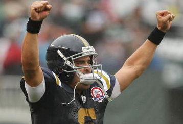 EAST RUTHERFORD, NJ - SEPTEMBER 27:  Mark Sanchez #6 of The New York Jets celebrates a touchdown in the first quarter against The Tennessee Titans during their game on September 27, 2009 at Giants Stadium in East Rutherford, New Jersey.  (Photo by Al Bello/Getty Images)