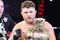 UNCASVILLE, CT - MAY 16:  Roy Nelson (White Trunks) of the Lions Den celebrates after beating Brad Imes of the MilesTech Fighting System during their bout presented by the International Fighting League at the Mohegan Sun Arena May 16, 2008 in Uncasville, Connecticut.  (Photo by Al Bello/Getty Images)