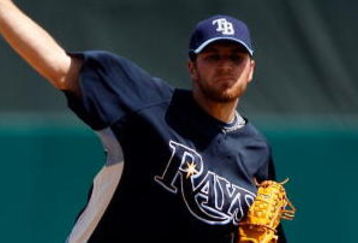 FORT MYERS, FL - MARCH 08:  Pitcher Wade Davis #58 of the Tampa Bay Rays pitches against the Boston Red Sox during a Grapefruit League Spring Training Game at City of Palms Park on March 8, 2009 in Fort Myers, Florida.  (Photo by J. Meric/Getty Images)