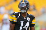 PITTSBURGH - AUGUST 13:  Limas Sweed #14 of the Pittsburgh Steelers warms up prior to the preseason NFL game against the Arizona Cardinals at Heinz Field on August 13, 2009 in Pittsburgh, Pennsylvania.  The Steelers won 20-10.  (Photo by Rick Stewart/Getty Images)