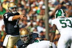 SOUTH BEND, IN - SEPTEMBER 19: Jimmy Clausen #7 of the Notre Dame Fighting Irish points out a defensive alingment including Greg Jones #53 of the Michigan State Spartans on September 19, 2009 at Notre Dame Stadium in South Bend, Indiana. Notre Dame defeated Michigan State 33-30. (Photo by Jonathan Daniel/Getty Images)