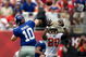 TAMPA, FL - SEPTEMBER 27:  Defensive back Ronde Barber #20 of the Tampa Bay Buccaneers tries to deflect the pass of quarterback Eli Manning #10 of the New York Giants during the game at Raymond James Stadium on September 27, 2009 in Tampa, Florida.  (Photo by J. Meric/Getty Images)