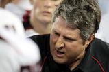 HOUSTON - SEPTEMBER 26:Head coach Mike Leach of the Texas Tech Red Raiders gives instructions to his defense against the Houston Cougars  at Robertson Stadium on September 26, 2009 in Houston, Texas.  (Photo by Thomas B. Shea/Getty Images)