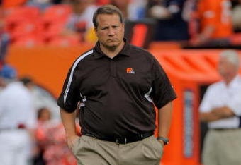 DENVER - SEPTEMBER 20:  Head coach Eric Mangini of the Cleveland Browns oversees warm ups prior to facing the Denver Broncos during NFL action at Invesco Field at Mile High on September 20, 2009 in Denver, Colorado. The Broncos defeated the Browns 27-6.  (Photo by Doug Pensinger/Getty Images)