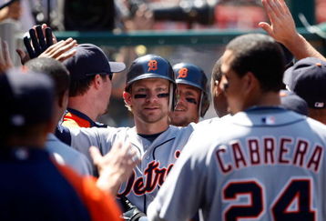 ANAHEIM, CA - AUGUST 26:  Adam Everett #4 of the Detroit Tigers is congratulated in the dugout after hitting a two-run home run in the fifth inning against the Los Angeles Angels of Anaheim at Angel Stadium on August 26, 2009 in Anaheim, California. The Angels defeated the Tigers 4-2.  (Photo by Jeff Gross/Getty Images)