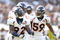 OAKLAND, CA - SEPTEMBER 27:   Wesley Woodyard #59 congratulates Elvis Dumervil #92 of the Denver Broncos after Dumervil sacked JaMarcus Russell of the Oakland Raiders at the Oakland-Alameda County Coliseum on September 27, 2009 in Oakland, California.  (Photo by Ezra Shaw/Getty Images)