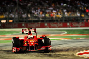 SINGAPORE - SEPTEMBER 27:  Kimi Raikkonen of Finland and Ferrari drives during the Singapore Formula One Grand Prix at the Marina Bay Street Circuit on September 27, 2009 in Singapore.  (Photo by Clive Mason/Getty Images)
