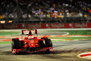 SINGAPORE - SEPTEMBER 27:  Kimi Raikkonen of Finland and Ferrari drives during the Singapore Formula One Grand Prix at the Marina Bay Street Circuit on September 27, 2009 in Singapore.  (Photo by Clive Mason/Getty Images)