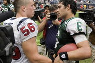 HOUSTON - SEPTEMBER 13:  Linebacker Brian Cushing #56 of the Houston Texans congratulates quarterback Mark Sanchez #6 of the New York Jets after the Jets defeated the Texans 24-7 at Reliant Stadium on September 13, 2009 in Houston, Texas. Cushing and Sanchez were roommates and teammates at USC.  (Photo by Bob Levey/Getty Images)