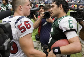 HOUSTON - SEPTEMBER 13:  Linebacker Brian Cushing #56 of the Houston Texans congratulates quarterback Mark Sanchez #6 of the New York Jets after the Jets defeated the Texans 24-7 at Reliant Stadium on September 13, 2009 in Houston, Texas. Cushing and Sanchez were roommates and teammates at USC.  (Photo by Bob Levey/Getty Images)