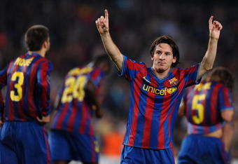 BARCELONA, SPAIN - SEPTEMBER 29:  Lionel Messi of Barcelona celebrates scoring his sides opening goal during the Champions League group F match between Barcelona and Dynamo Kiev at the Camp Nou Stadium on September 29, 2009 in Barcelona, Spain. Barcelona won the match 2-0.  (Photo by Jasper Juinen/Getty Images)