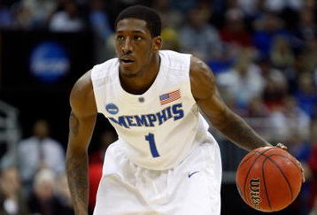KANSAS CITY, MO - MARCH 21:  Willie Kemp #1 of the Memphis Tigers looks to make a play on the dribble during their second round game against the Maryland Terrapins in the NCAA Division I Men's Basketball Tournament at the Sprint Center on March 21, 2009 in Kansas City, Missouri. The Tigers defeated the Terrapins 89-70.  (Photo by Jamie Squire/Getty Images)