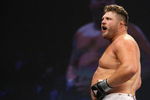 UNCASVILLE, CT - MAY 16: Roy Nelson (White Trunks) of the Lions Den celebrates after beating Brad Imes MilesTech Fighting System during their bout presented by the International Fighting League at the Mohegan Sun Arena May 16, 2008 in Uncasville, Connecticut.  (Photo by Al Bello/Getty Images)