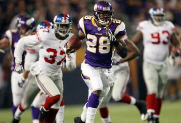 MINNEAPOLIS - DECEMBER 28:   Adrian Peterson #28 of the Minnesota Vikings runs the ball in for a touchdown as James Butler of the New York Giants defends on December 28, 2008 at the Hubert H. Humphrey Metrodome in Minneapolis, Minnesota. The Vikings defeated the Giants 20-19. (Photo by Elsa/Getty Images)