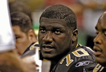 New Orleans Saints rookie tackle Jamal Brown checks play  during  a pre-season game against the Baltimore Ravens  August 26, 2005 in New Orleans.  (Photo by Al Messerschmidt/Getty Images)