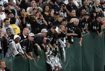 OAKLAND, CA - AUGUST 25: The Raider Nation in the famous black hole cheer on their Oakland Raiders as the Oakland Raiders host the Detroit Lions at McAfee Stadium on August 25, 2006 in Oakland, California. (Photo by David Paul Morris /Getty Images)