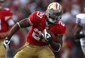 SAN FRANCISCO - AUGUST 22: Glen Coffee #29 of the San Francisco 49ers runs against the Oakland Raiders during a preseason game on August 22, 2009 at Candlestick Park in San Francisco, California.  (Photo by Jed Jacobsohn/Getty Images)