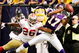 MINNEAPOLIS, MN - SEPTEMBER 27: Greg Lewis #17 of the Minnesota Vikings catches a 32-yard pass for a touchdown with two seconds on the clock against Mark Roman #26 of the San Francisco 49ers at Hubert H. Humphrey Metrodome on September 27, 2009 in Minneapolis, Minnesota. The Vikings defeated the 49ers 27-24. (Photo by Genevieve Ross/Getty Images)