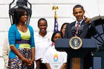 WASHINGTON - SEPTEMBER 16:  U.S. President Barack Obama speaks during an event on the South Lawn of the White House promoting the city of Chicago�s bid for the 2016 Summer Olympics with First Lady Michelle Obama (L) September 16, 2009 in Washington, DC. The Obamas joined Chicago Mayor Richard Daley, members of the USOC, and representatives from the Chicago2016 group during the event.  (Photo by Win McNamee/Getty Images)