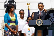 WASHINGTON - SEPTEMBER 16:  U.S. President Barack Obama speaks during an event on the South Lawn of the White House promoting the city of Chicago�s bid for the 2016 Summer Olympics with First Lady Michelle Obama (L) September 16, 2009 in Washington, DC. The Obamas joined Chicago Mayor Richard Daley, members of the USOC, and representatives from the Chicago2016 group during the event.  (Photo by Win McNamee/Getty Images)