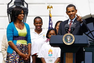 WASHINGTON - SEPTEMBER 16:  U.S. President Barack Obama speaks during an event on the South Lawn of the White House promoting the city of Chicago�s bid for the 2016 Summer Olympics with First Lady Michelle Obama (L) September 16, 2009 in Washington, DC. The Obamas joined Chicago Mayor Richard Daley, members of the USOC, and representatives from the Chicago2016 group during the event.  (Photo by Win McNamee/Getty Images)