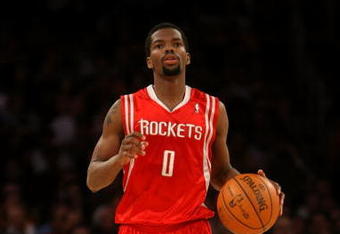 LOS ANGELES, CA - MAY 12:  Aaron Brooks #0 of the Houston Rockets moves the ball against the Los Angeles Lakers in Game Five of the Western Conference Semifinals during the 2009 NBA Playoffs at Staples Center on May 12, 2009 in Los Angeles, California. NOTE TO USER: User expressly acknowledges and agrees that, by downloading and or using this photograph, User is consenting to the terms and conditions of the Getty Images License Agreement.  (Photo by Stephen Dunn/Getty Images)