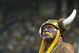 MINNEAPOLIS - SEPTEMBER 26:  A fan of the Minnesota Vikings wears face paint and a viking hat during the game against the Chicago Bears at the Hubert H. Humphrey Metrodome on September 26, 2004 in Minneapolis, Minnesota. The Vikings defeated the Bears 27-22. (Photo by Jeff Gross/Getty Images)