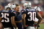 FOXBORO, MA - AUGUST 20:  Head coach Bill Belichick of the New England Patriots talks with Pat Chung #25 and Brandon McGowan #30 against the Cincinnati Bengals during their preseason game at Gillette Stadium on August 20, 2009 in Foxboro, Massachusetts.  (Photo by Jim Rogash/Getty Images)