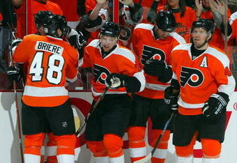 PHILADELPHIA - APRIL 19:  Claude Giroux #28 (C) of the Philadelphia Flyers celebrates his goal against the Pittsburgh Penguins during Game Three of the Eastern Conference Quarterfinal Round of the 2009 NHL Stanley Cup Playoffs  at the Wachovia Center on April 19, 2009 in Philadelphia, Pennsylvania.  (Photo by Jim McIsaac/Getty Images)