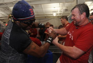 BOSTON - SEPTEMBER 23:  Sean Casey #22 and David Ortiz #34 of the Boston Red Sox celebrate in the locker room with after the 5-4 win over the Cleveland Indians clinched the Red Sox the Wild Card on September 23, 2008 at Fenway Park in Boston, Massachusetts.  (Photo by Michael Ivins-Pool/Getty Images)