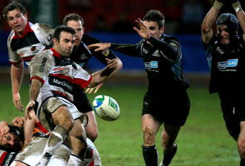 GLASGOW, UNITED KINGDOM - JANUARY 18: Glen Jackson of Saracens clears the ball during  Heineken Cup match against Glasgow Warriors at Firhill Stadium January 18, 2007 in Glasgow , Scotland.  (Photo by Jeff J Mitchell/Getty Images)