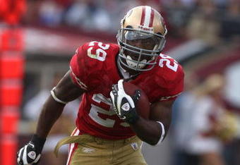 SAN FRANCISCO - AUGUST 22:  Glen Coffee #29 of the San Francisco 49ers runs against the Oakland Raiders during a preseason game on August 22, 2009 at Candlestick Park in San Francisco, California.  (Photo by Jed Jacobsohn/Getty Images)