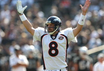 OAKLAND, CA - SEPTEMBER 27:  Kyle Orton #8 of the Denver Broncos celebrates after Knowshon Moreno scored a touchdown in the second half against the Oakland Raiders on September 27, 2009 during an NFL game at the Oakland-Alameda County Coliseum in Oakland, California.  (Photo by Jed Jacobsohn/Getty Images)