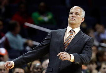 CHARLOTTE, NC - MARCH 16:  Head coach Jay Triano of the Toronto Raptors watches his team in action against the Charlotte Bobcats during their game at Time Warner Cable Arena on March 16, 2009 in Charlotte, North Carolina.  NOTE TO USER: User expressly acknowledges and agrees that, by downloading and/or using this Photograph, user is consenting to the terms and conditions of the Getty Images License Agreement.  (Photo by Streeter Lecka/Getty Images)