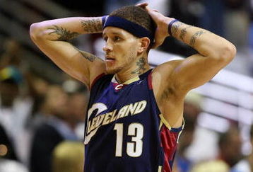 ORLANDO, FL - MAY 30:  Delonte West #13 of the Cleveland Cavaliers reacts after a play against the Orlando Magic in Game Six of the Eastern Conference Finals during the 2009 Playoffs at Amway Arena on May 30, 2009 in Orlando, Florida. NOTE TO USER: User expressly acknowledges and agrees that, by downloading and or using this photograph, User is consenting to the terms and conditions of the Getty Images License Agreement  (Photo by Elsa/Getty Images)