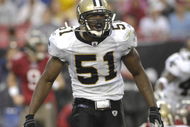 TAMPA, FL - NOVEMBER 30: Linebacker Jonathan Vilma #51 of the New Orleans Saints yells during play against the Tampa Bay Buccaneers at Raymond James Stadium on November 30, 2008 in Tampa, Florida. (Photo by Al Messerschmidt/Getty Images)