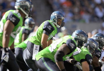 SEATTLE - SEPTEMBER 27:  Quarterback Seneca Wallace #15 of the Seattle Seahawks calls the play during the game against the Chicago Bears on September 27, 2009 at Qwest Field in Seattle, Washington. The Bears defeated the Seahawks 25-19. (Photo by Otto Greule Jr/Getty Images) 